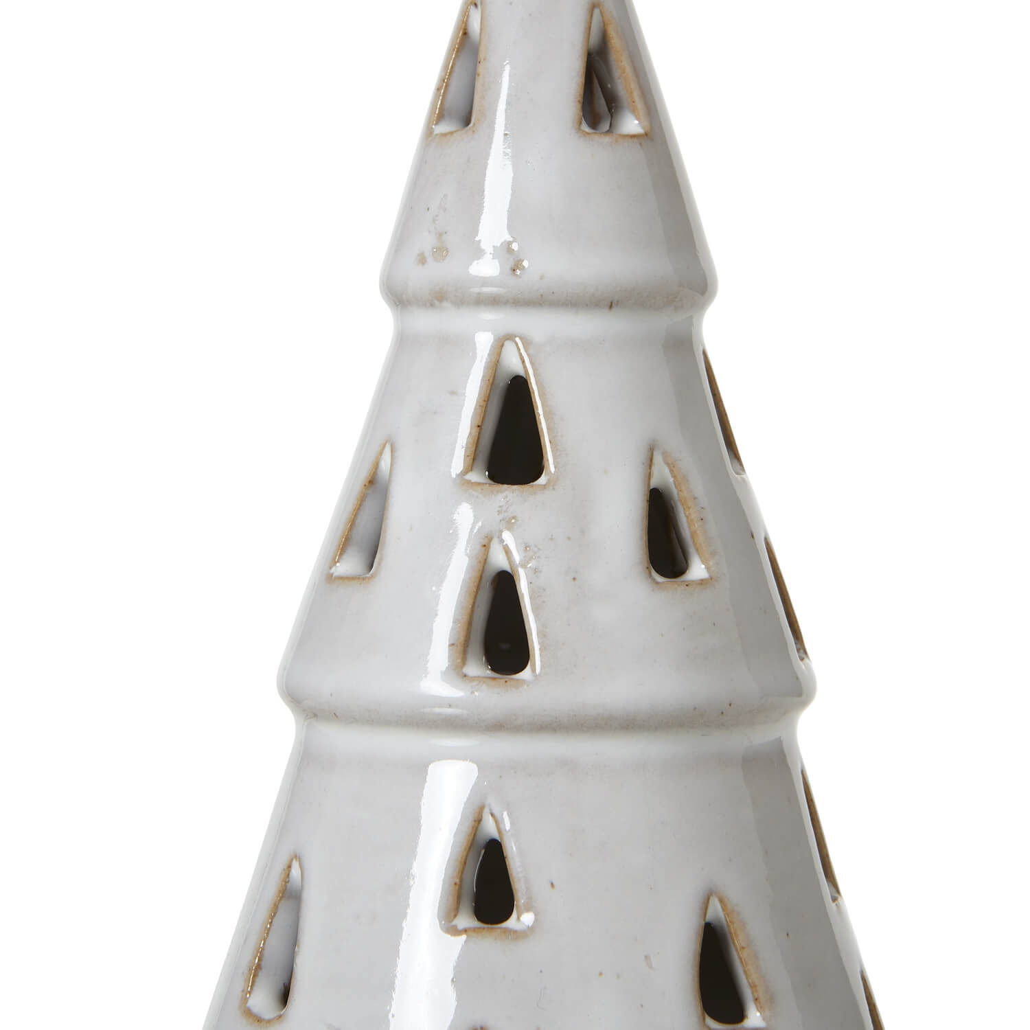 Handcrafted white ceramic LED tree with intricate cut-out patterns, casting warm ambient light for minimalist decor. by RoomLondon at brixbailey.com