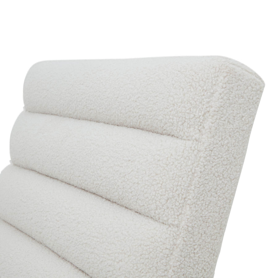 Cream boucle ribbed ark chair with curved black metal frame and channeled upholstery for modern interiors by Sostter at brixbailey.com