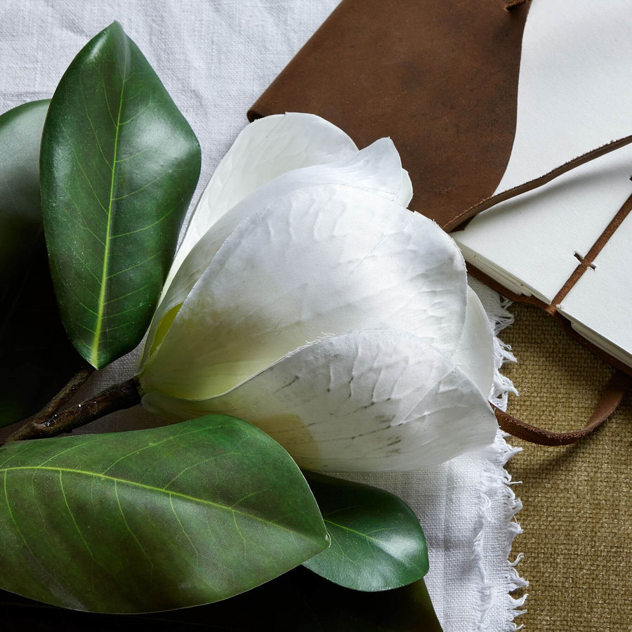 Lifelike white magnolia stem with intricate veining, premium plastic, 78cm tall for elegant home decor arrangements by Sostter at brixbailey.com
