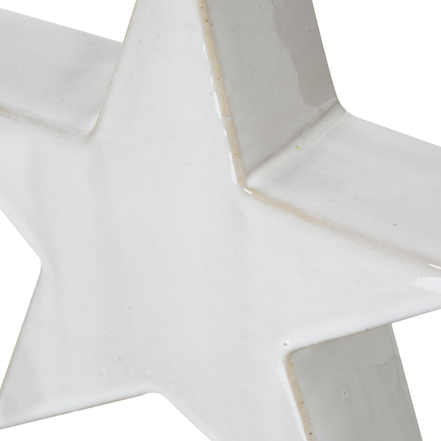 Minimalist white ceramic star dÃ©cor, modern sculptural accent for shelves or mantels, 19cm high, crisp finish by Sostter at brixbailey.com