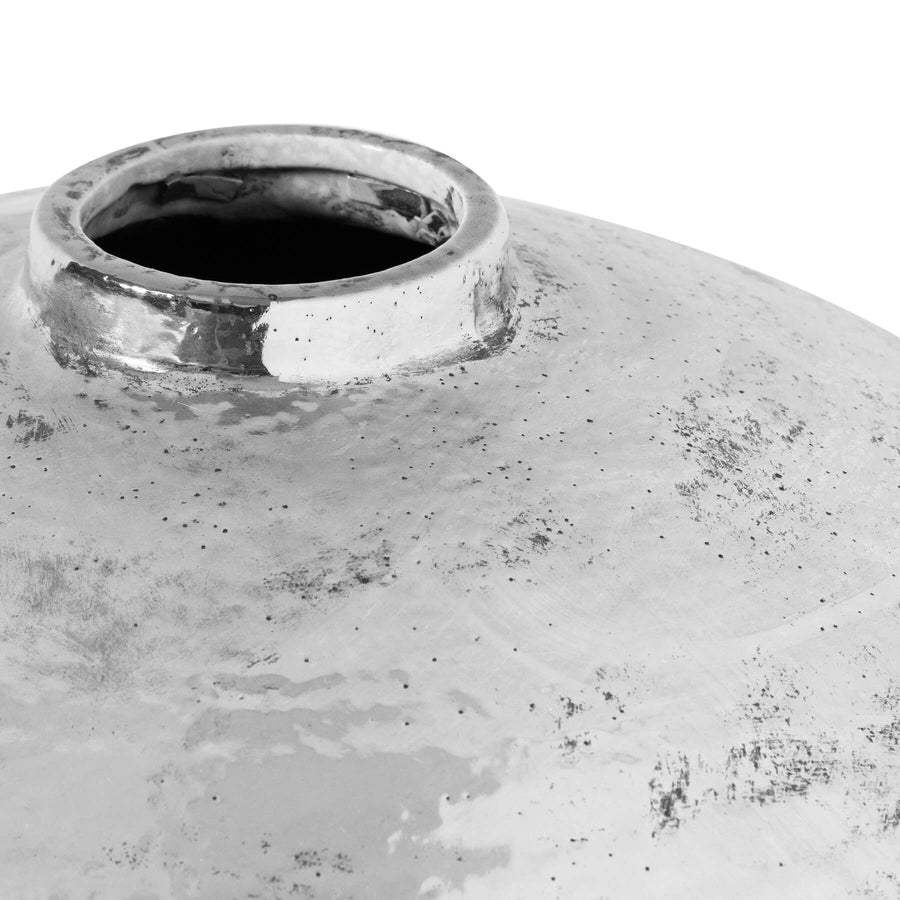 Hand-hammered silver ceramic vase with reflective metallic finish, modern home decor statement piece. by Sostter at brixbailey.com