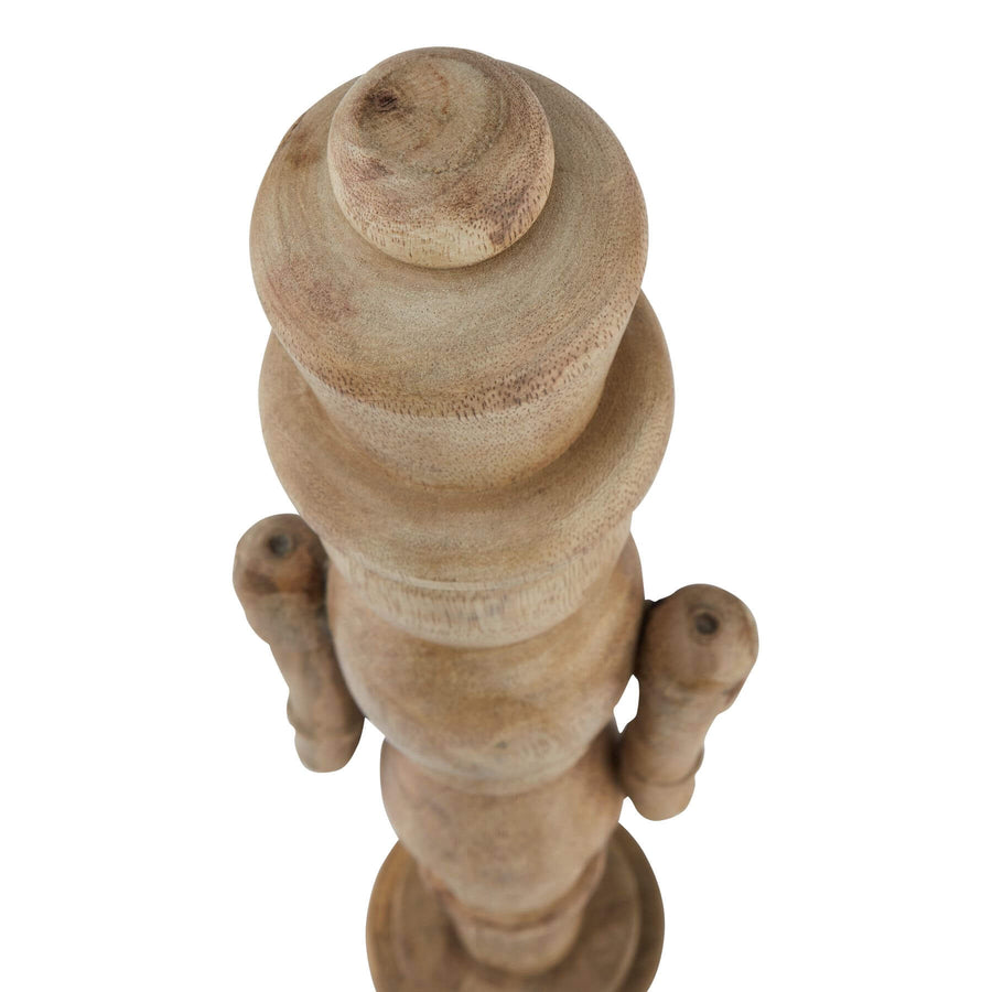 Handcrafted wooden nutcracker, 50cm tall, warm brown finish, classic silhouette with rustic details for holiday decor. by Sostter at brixbailey.com