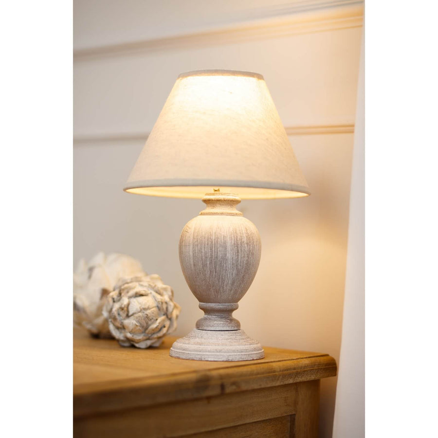 Pewter-toned Otem urn table lamp with white linen shade on wooden base, 25cm tall, for farmhouse or modern decor by Sostter at brixbailey.com