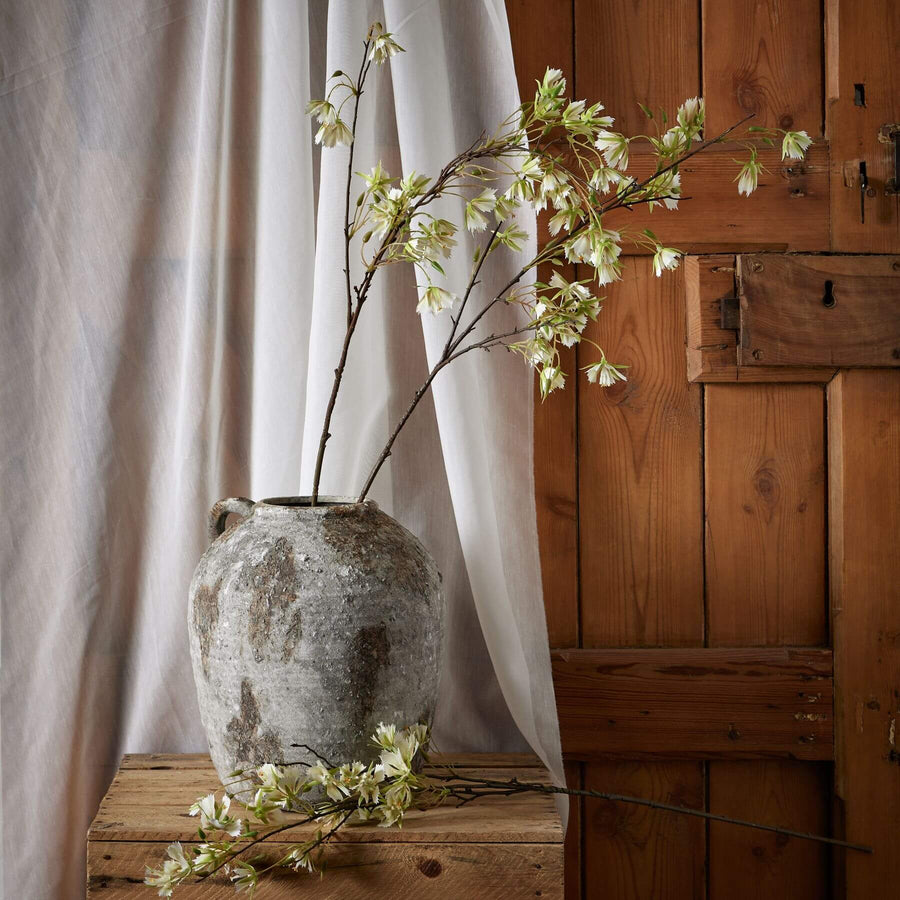 Lifelike artificial Elaeocarpus stem with finely textured green leaves, 100cm tall, for zero-maintenance botanical decor. by Sostter at brixbailey.com