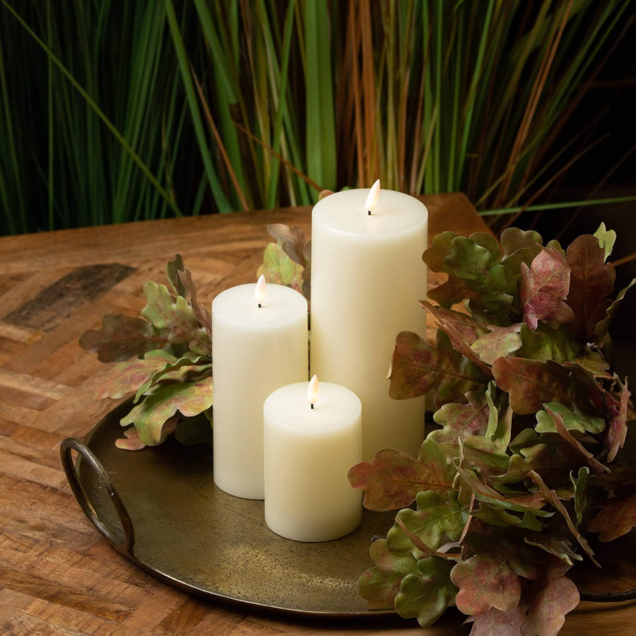 Warm ivory LED flameless candle with realistic flicker, 15cm tall, for worry-free ambiance by Sostter at brixbailey.com