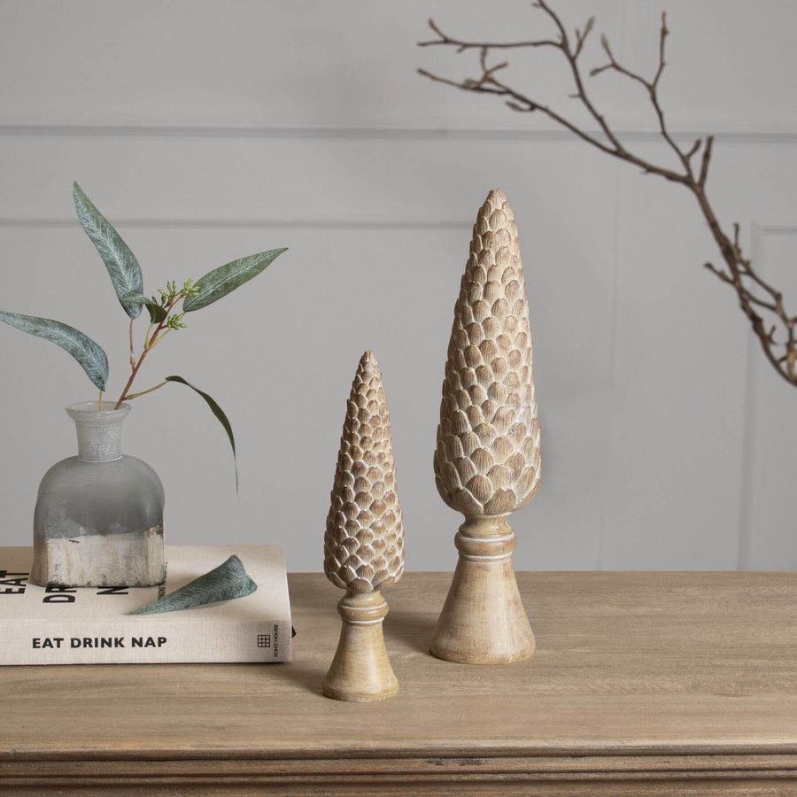 Handcrafted pinecone sculpture in warm brown resin, 26cm tall, with realistic wood texture and weighted base for stability. by Sostter at brixbailey.com