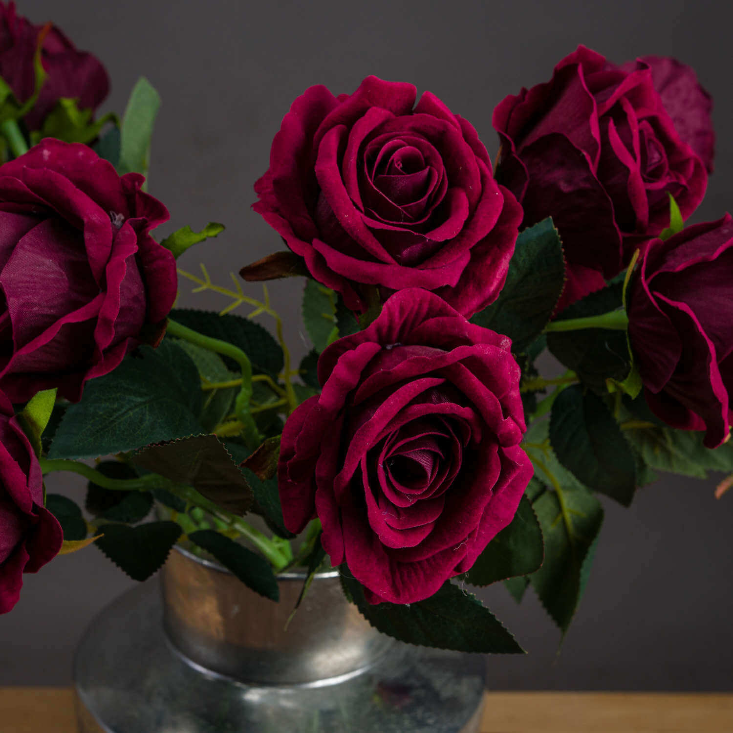 Lifelike deep crimson artificial rose with velvety petals and natural stems, inspired by Rosa 'Black Baccara'. by Sostter at brixbailey.com