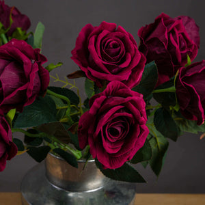 Lifelike deep crimson artificial rose with velvety petals and natural stems, inspired by Rosa 'Black Baccara'. by Sostter at brixbailey.com