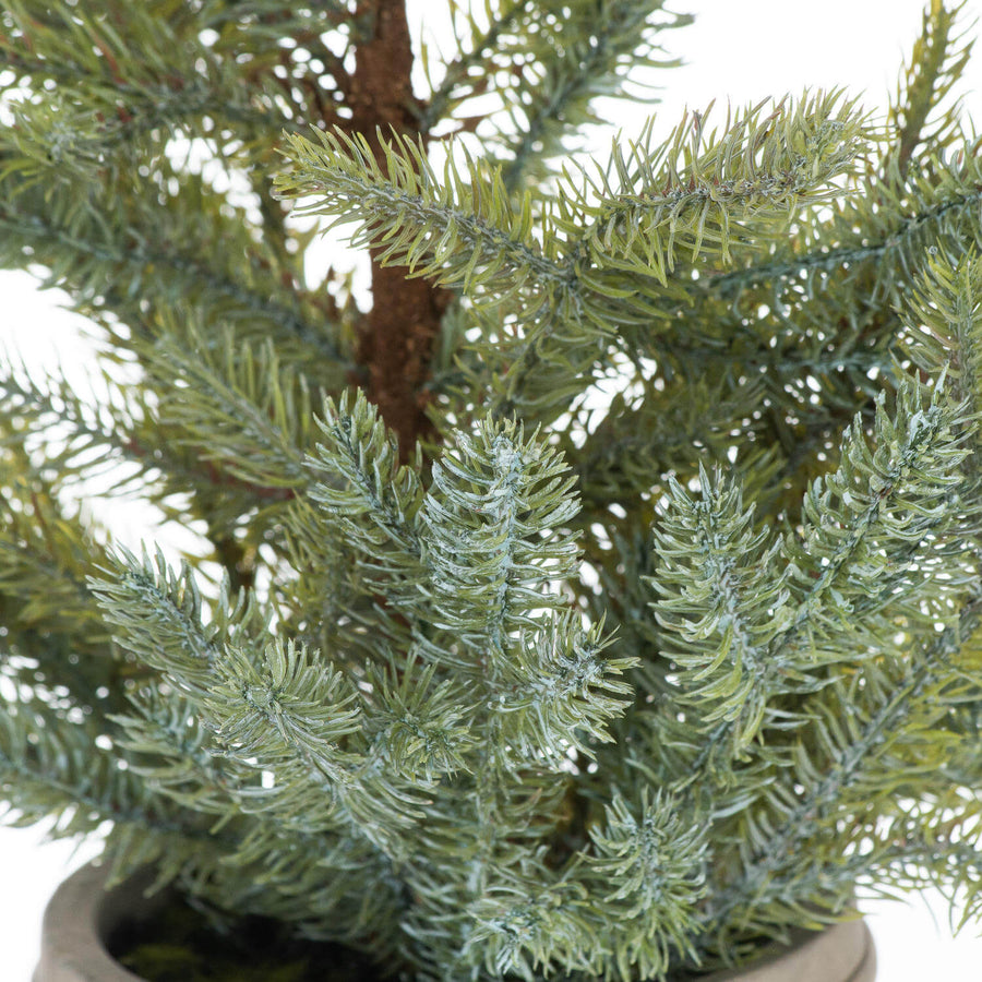 Artisanal tabletop Christmas tree with lifelike pine branches in rustic stone pot, 48cm tall, rich evergreen color by Sostter at brixbailey.com