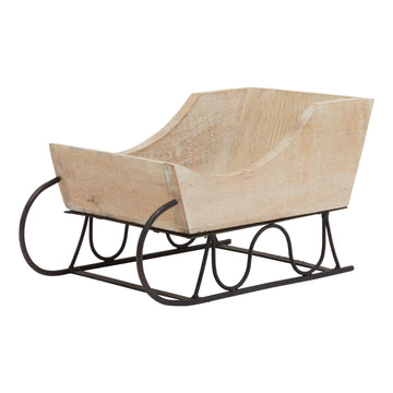 White-wash wooden decorative sleigh with distressed details, farmhouse-style centerpiece for seasonal displays. by Sostter at brixbailey.com