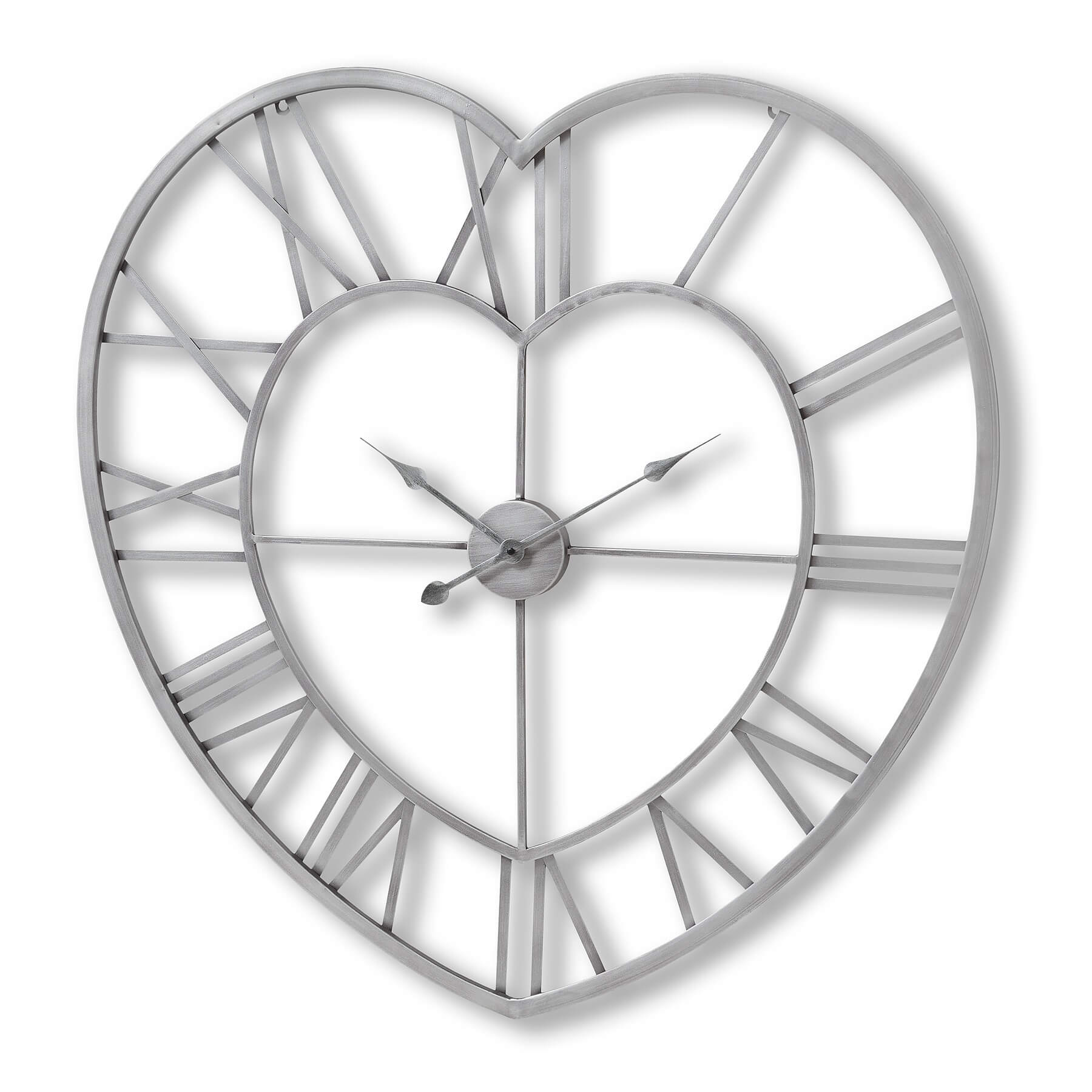 Elegant silver heart-shaped skeleton wall clock with roman numerals, 89cm, minimalist metal design for modern decor by Sostter at brixbailey.com