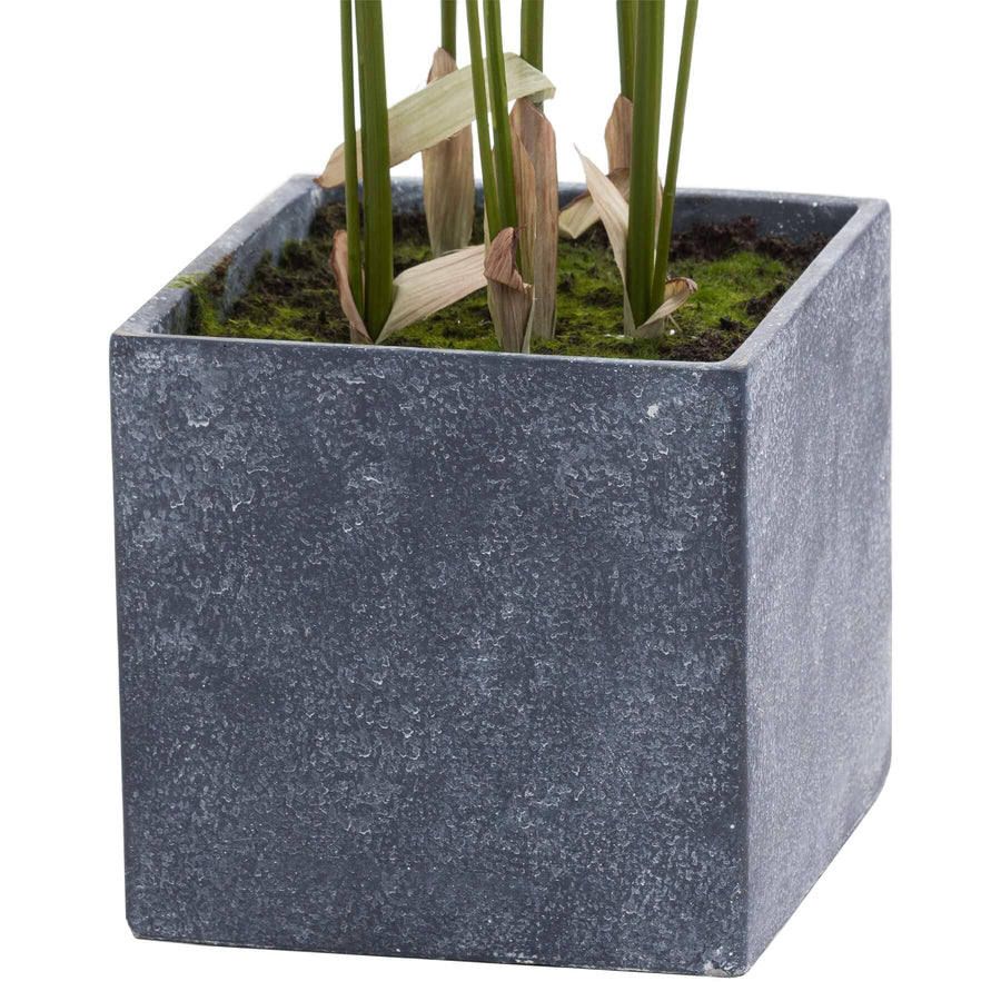 Lifelike faux palm tree in vibrant green with grey square container, 130cm tall, zero-maintenance artificial plant by Sostter at brixbailey.com