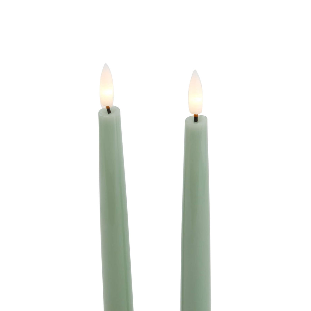 Sage green LED candle with realistic wax texture, flickering flame effect, 25 cm tall for elegant home decor by RoomLondon at brixbailey.com