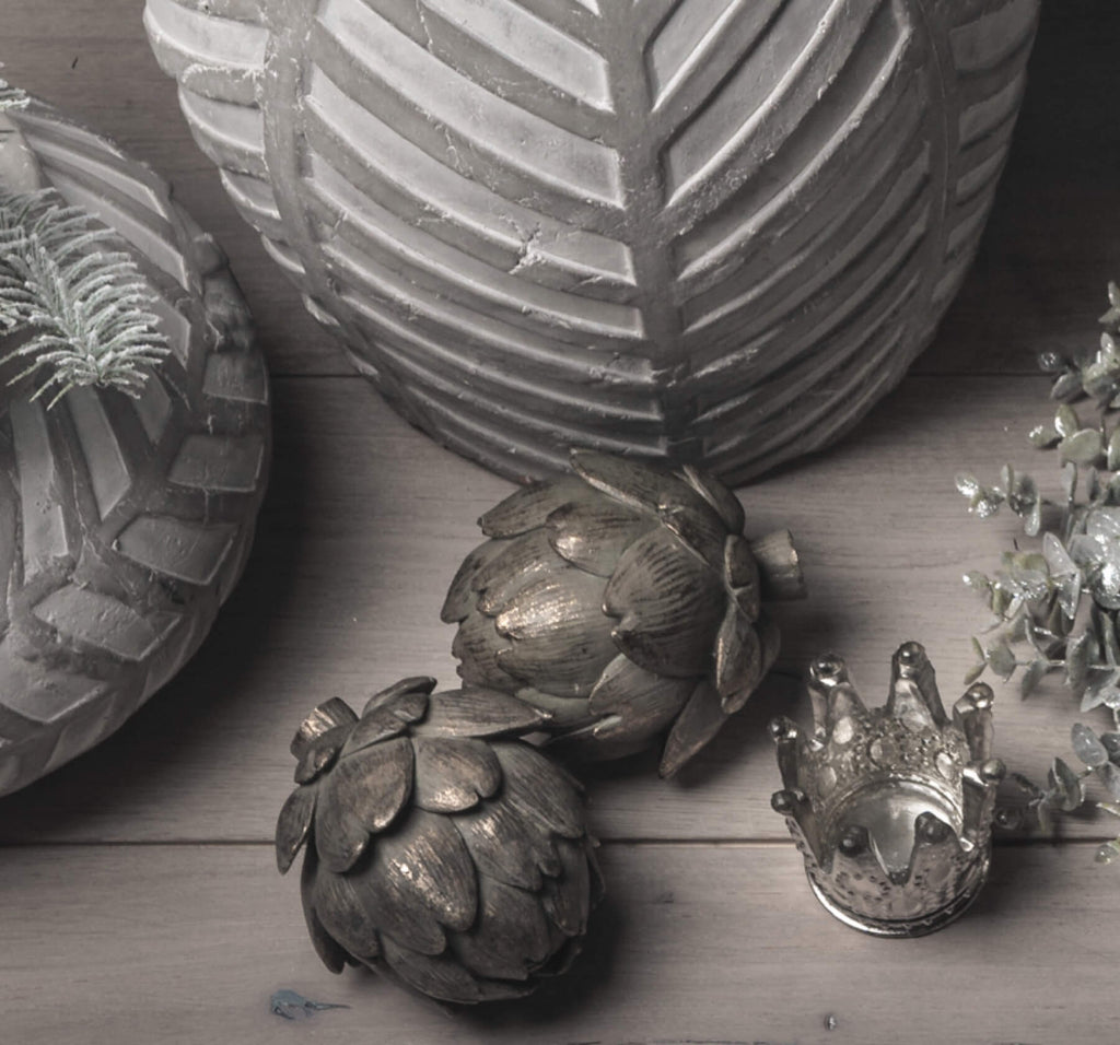 Handcrafted bronze artichoke sculpture with intricate petals and antique patina, perfect for home decor. by Sostter at brixbailey.com