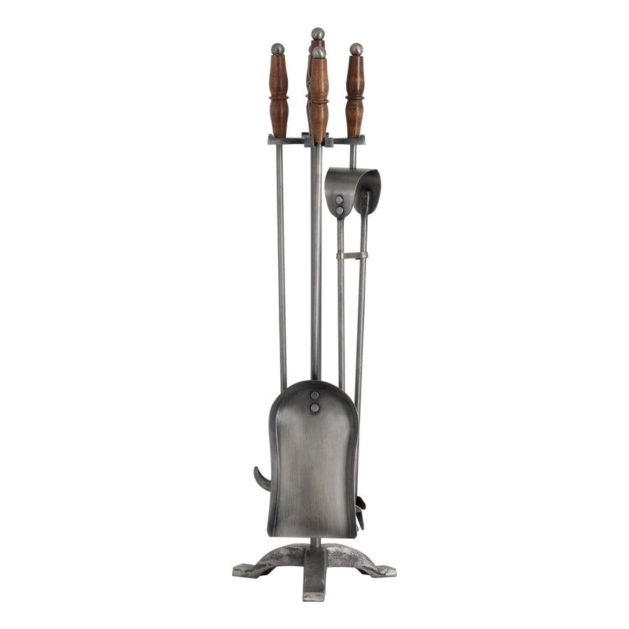 Handcrafted antique pewter fireplace set with wooden handles, earthy brown tones, and intricate metalwork. by Sostter at brixbailey.com