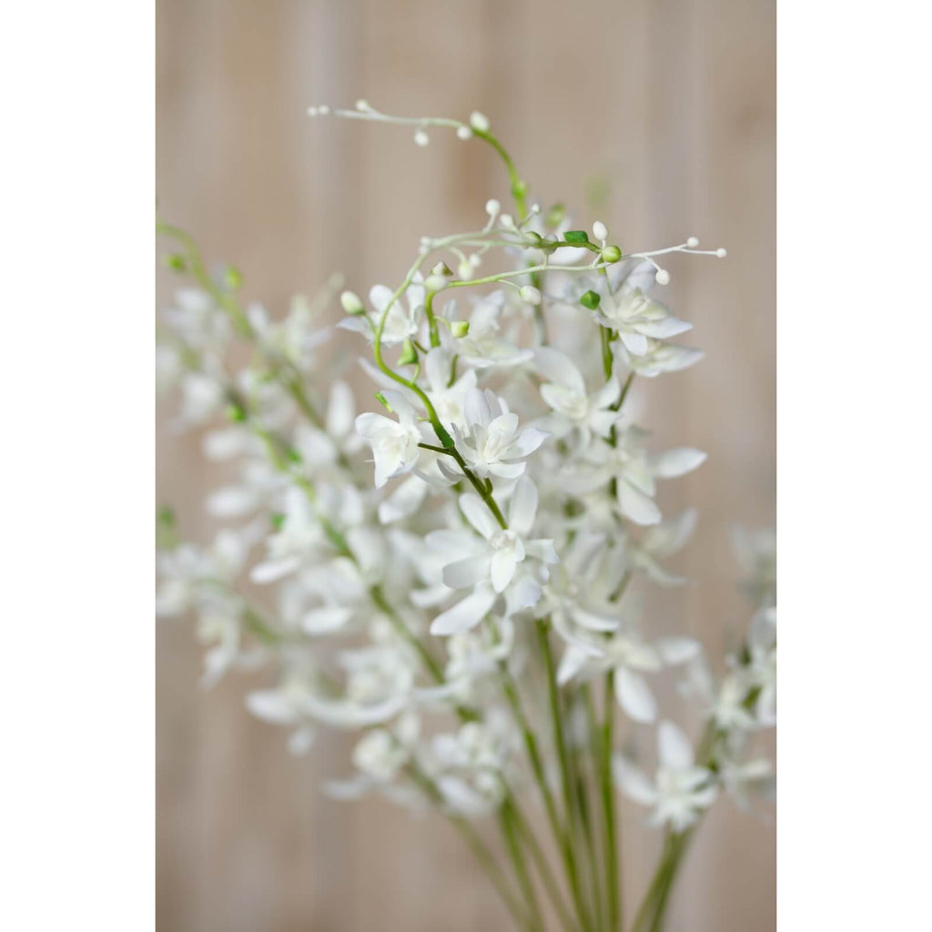 White cymbidium spray faux floral arrangement with lifelike blooms, perfect for modern home decor. by Sostter at brixbailey.com