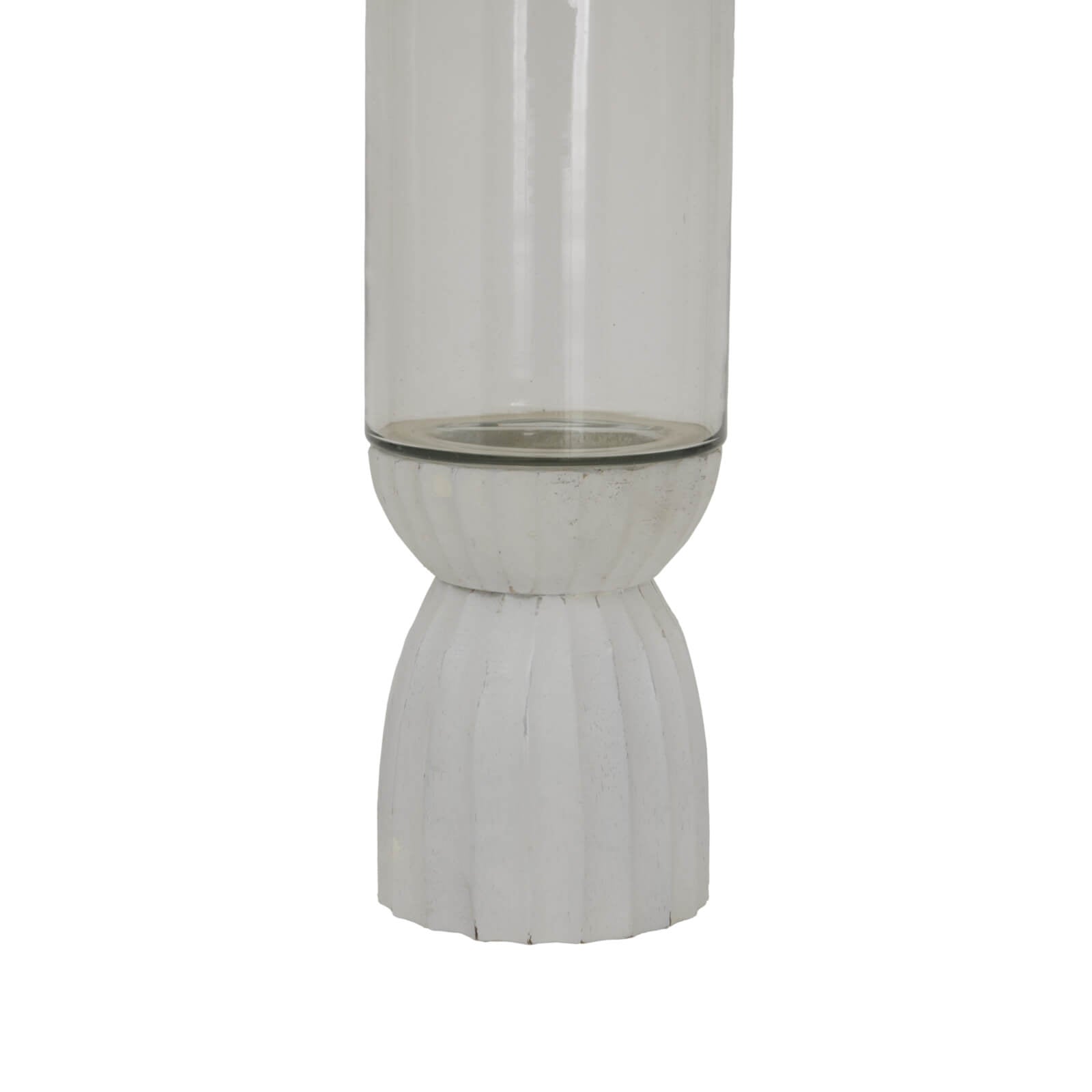 White carved glass hurricane lantern with intricate geometric patterns, warm atmospheric glow by RoomLondon at brixbailey.com