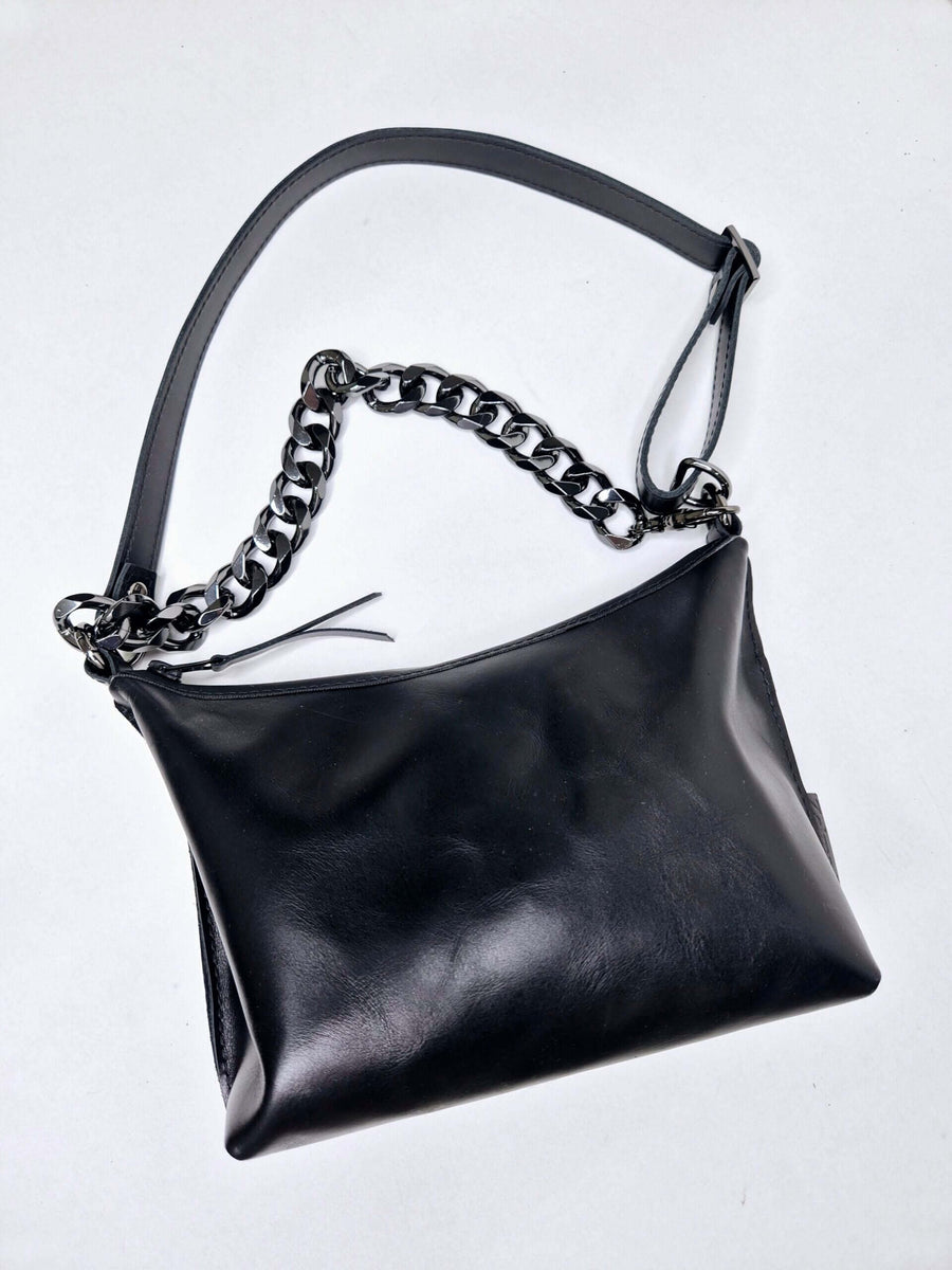 Classic Black Handbag: Elegant, Functional & Customizable by Zelma Kraft at brixbailey.com