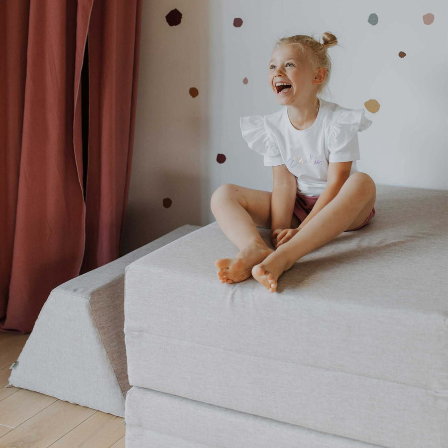 Versatile Montessori Play Sofa – Safe & Creative Fun for Kids by Monboxy at www.brixbailey.com