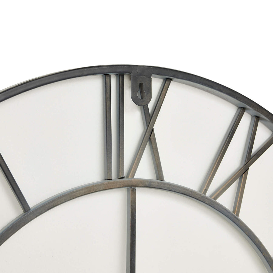 Grey oversized skeleton wall clock with Roman numerals, modern metal design, 80cm diameter, industrial decor focal point by Sostter at brixbailey.com