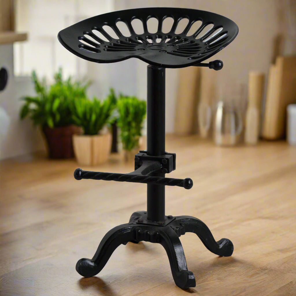 Black metal tractor seat stool with adjustable height for industrial-chic decor by RoomLondon at brixbailey.com