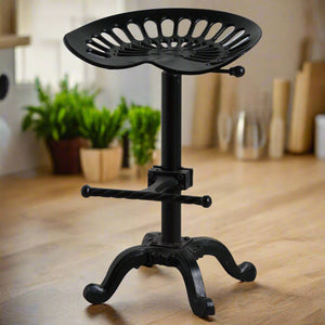 Black metal tractor seat stool with adjustable height for industrial-chic decor by RoomLondon at brixbailey.com