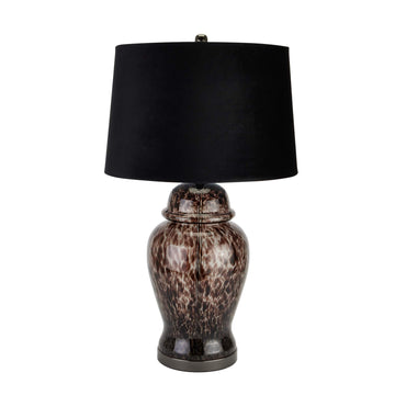 Handcrafted black and grey dappled glass table lamp with velvet shade, casting dynamic light patterns in modern decor. by Sostter at brixbailey.com
