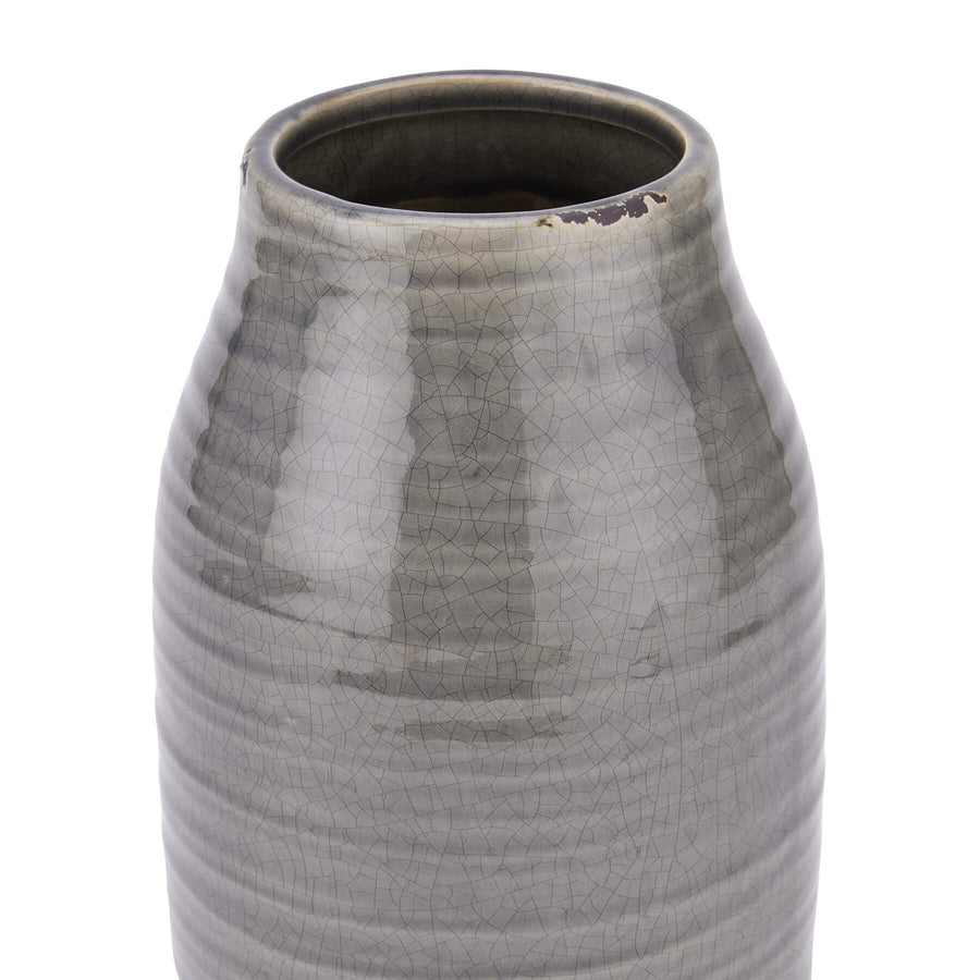 Handcrafted grey ceramic vase with crackle-glazed finish and distressed details, perfect for floral arrangements or decor. by Sostter at brixbailey.com