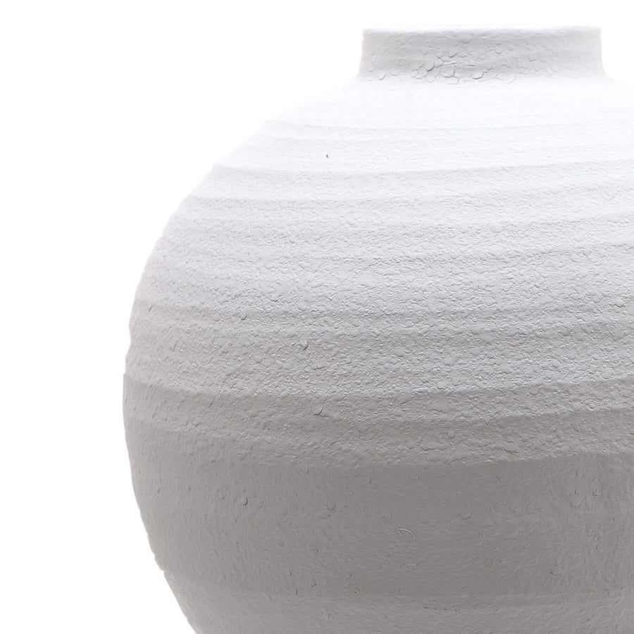 Handcrafted matte white ceramic vase with linear textures, modern minimalist design for floral displays. by Sostter at brixbailey.com