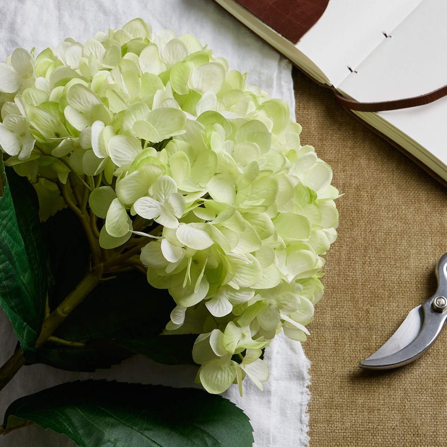 Lifelike oversized green hydrangea arrangement with hand-painted petals, perfect for home decor  by Sostter at brixbailey.com