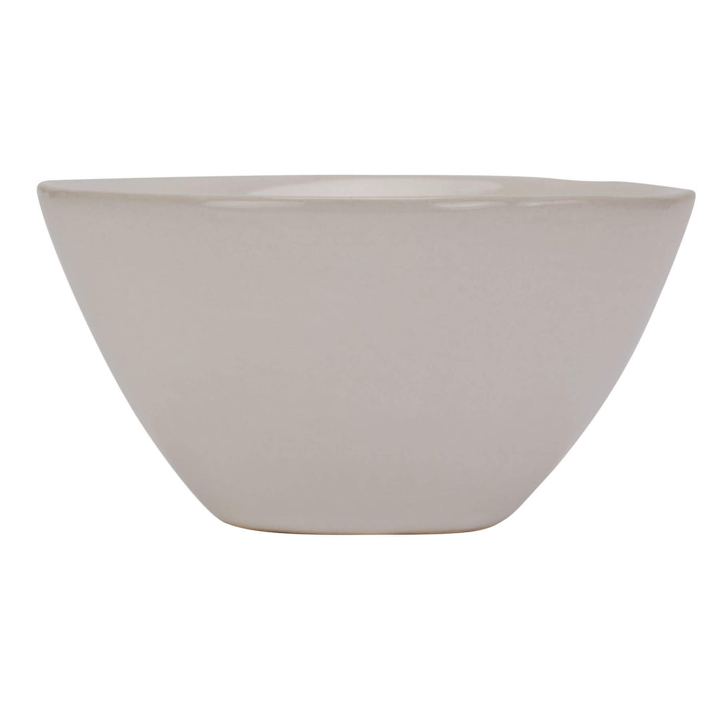 Handcrafted ceramic flower frog in off-white, glazed finish with precision holes for floral arrangements. by Sostter at brixbailey.com