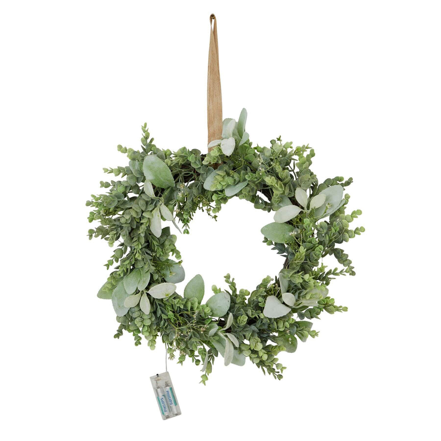 Handcrafted LED winter wreath with eucalyptus and lambâ€™s ear foliage, glowing warm white lights, natural green and silver accents. by Sostter at brixbailey.com