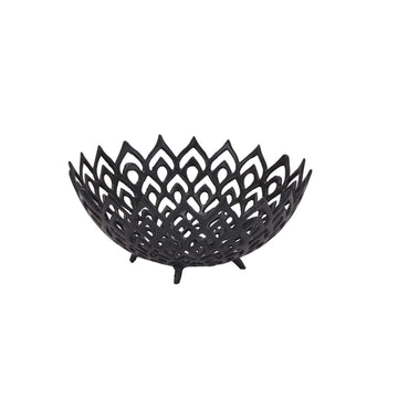 Matte black perforated steel bowl with intricate lattice design, casting dynamic light and shadow patterns by Sostter at brixbailey.com
