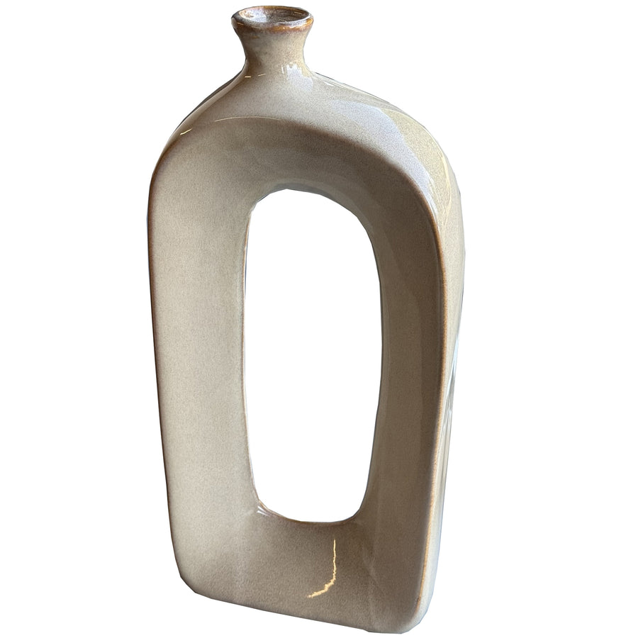 A perfect fusion of modern minimalism and organic design hollow vase for sculptural presence - Sabbia Collection decorative piece - versatile styling with floral arrangements and artistic display - contrasts with Lorenzo Rotund Fin Vase or Burnished Dipped Candle Holder - ideal for design-conscious consumers - contemporary home accessory - Height 43 cm, Depth 8 cm, Width 19 cm, Color Brown, Made From Ceramic by Hill Interiors at www.brixbailey.com