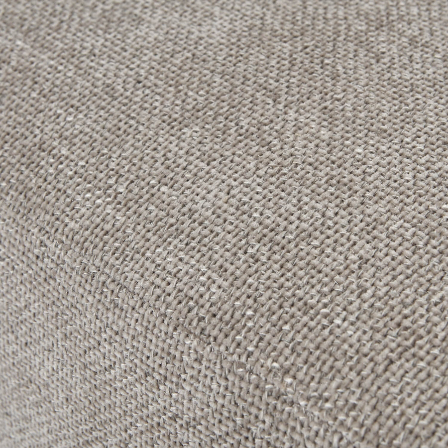 Taupe snuggle chair with plush cushioning and solid wood frame, perfect for cozy reading nooks and modern decor. by Sostter at brixbailey.com