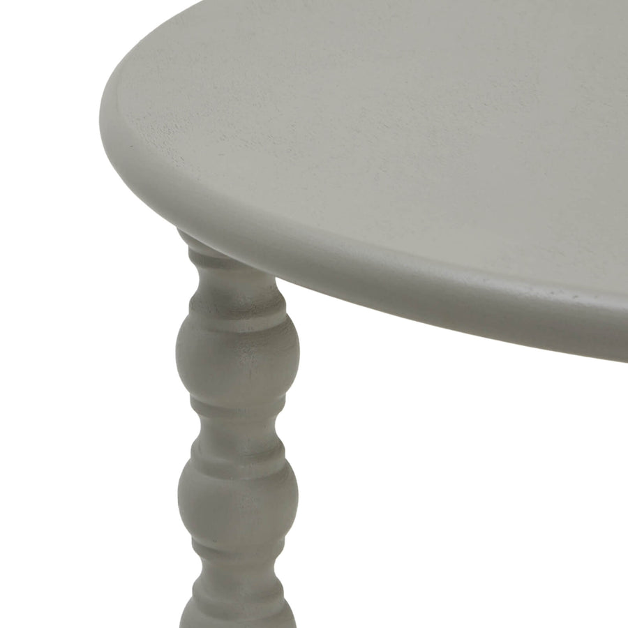 Grey circular wood accent table with modern design, perfect for living rooms or bedrooms. by Sostter at brixbailey.com