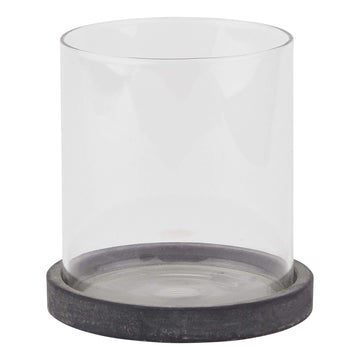 Grey ceramic hurricane lantern with glass panels, Mediterranean coastal style, casting ambient light patterns for indoor or outdoor decor. by Hill Interiors at brixbailey.com
