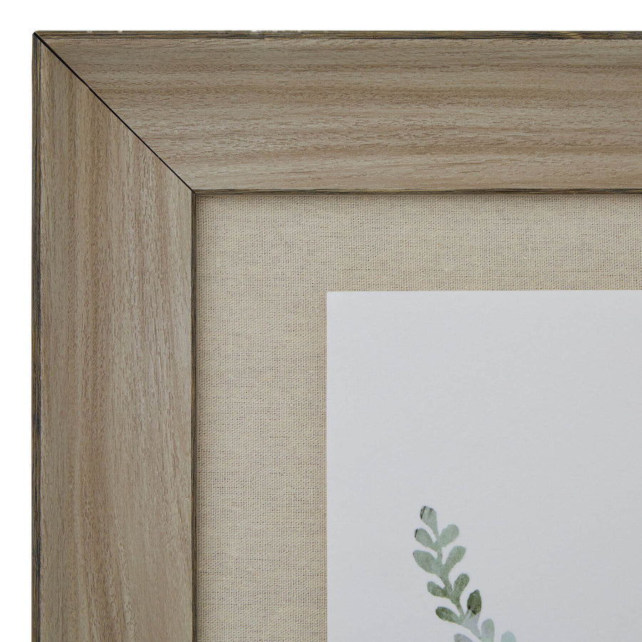 Hand-painted watercolor fern print in soft hues, framed in rustic brown wood, botanical wall art for nature-inspired decor by Sostter at brixbailey.com