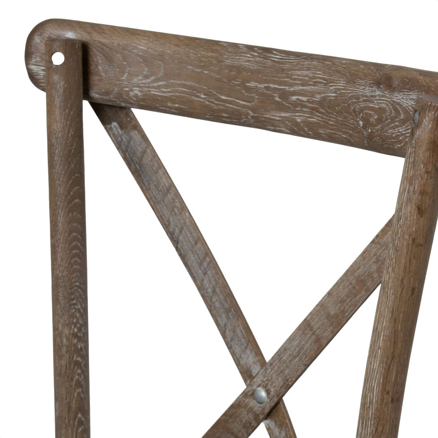Light oak cross back dining chair with solid wood construction and ergonomic curved seat by Sostter at brixbailey.com