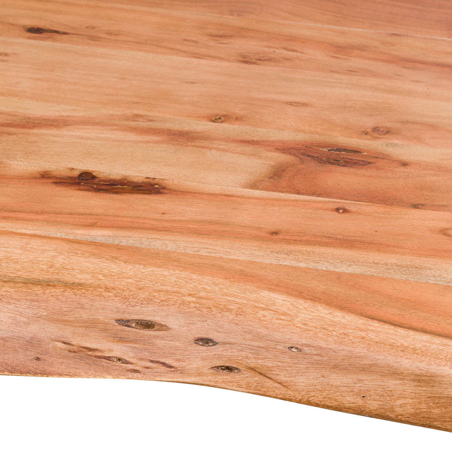 Handcrafted live edge dining table in Indian acacia wood with grey metal legs, showcasing natural grain for modern rustic decor. by Sostter at brixbailey.com
