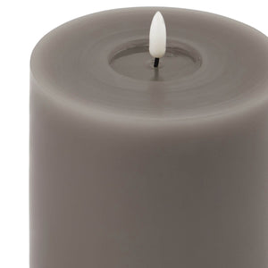 Grey melt-effect LED wax candle with realistic dripping texture and warm flameless glow for home decor by sostter at brixbailey.com