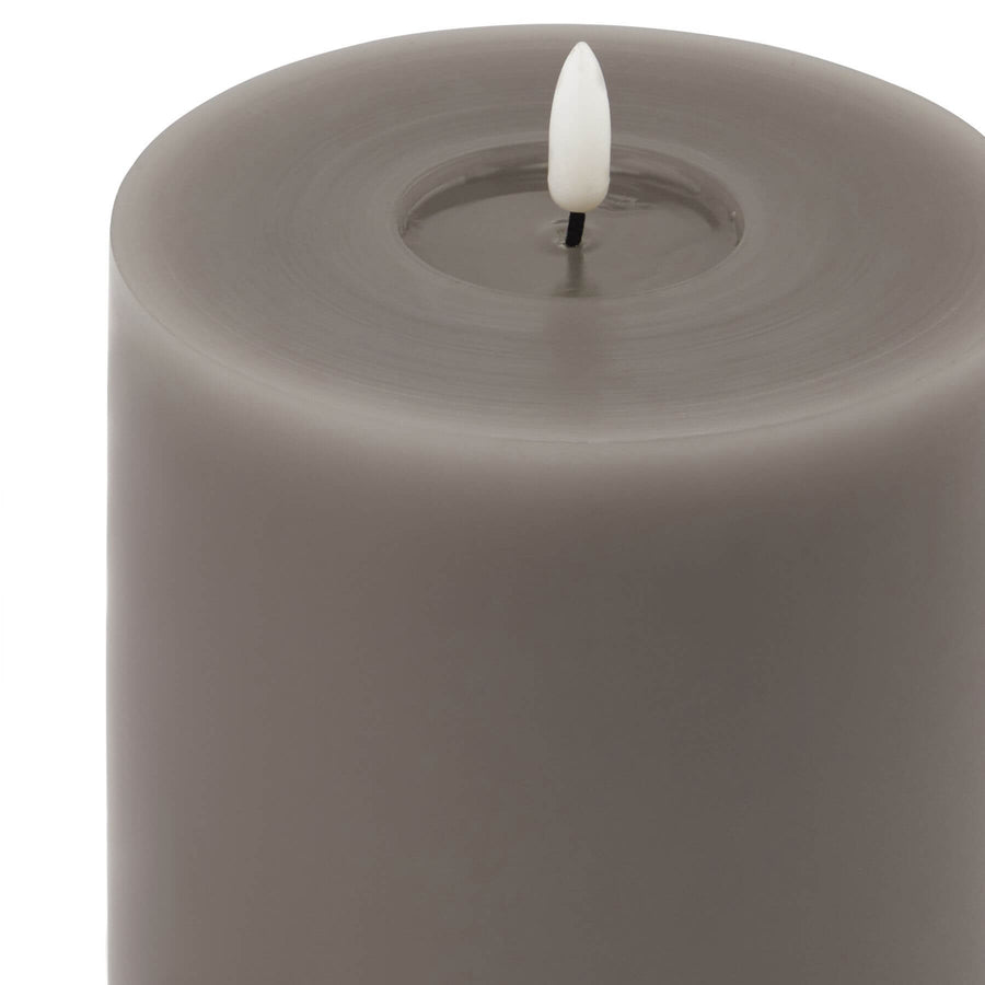 Grey melt-effect LED wax candle with realistic dripping texture and warm flameless glow for home decor by Hill Interiors at brixbailey.com