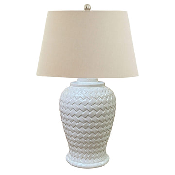 Handcrafted white ceramic chevron table lamp with linen shade, casting warm patterned light for modern home decor. by Sostter at brixbailey.com