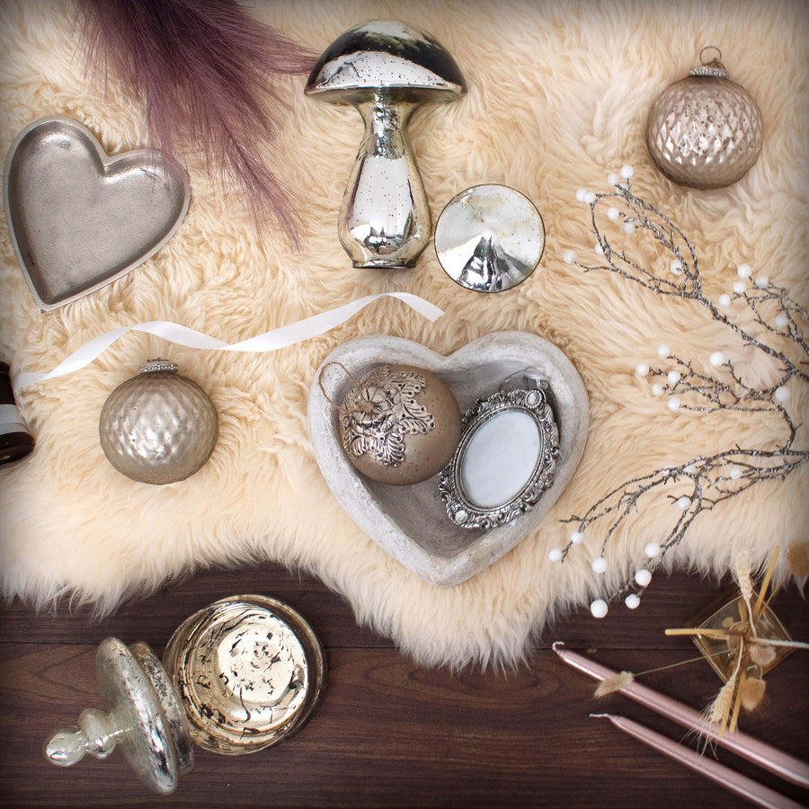 Handcrafted stone heart dish in warm cream with antiqued finish, rustic decor for keys or jewelry, 23cm wide by Sostter at brixbailey.com