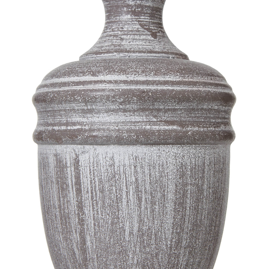 Weathered gray Nola Urn Table Lamp with white linen shade on wooden base by Sostter at brixbailey.com