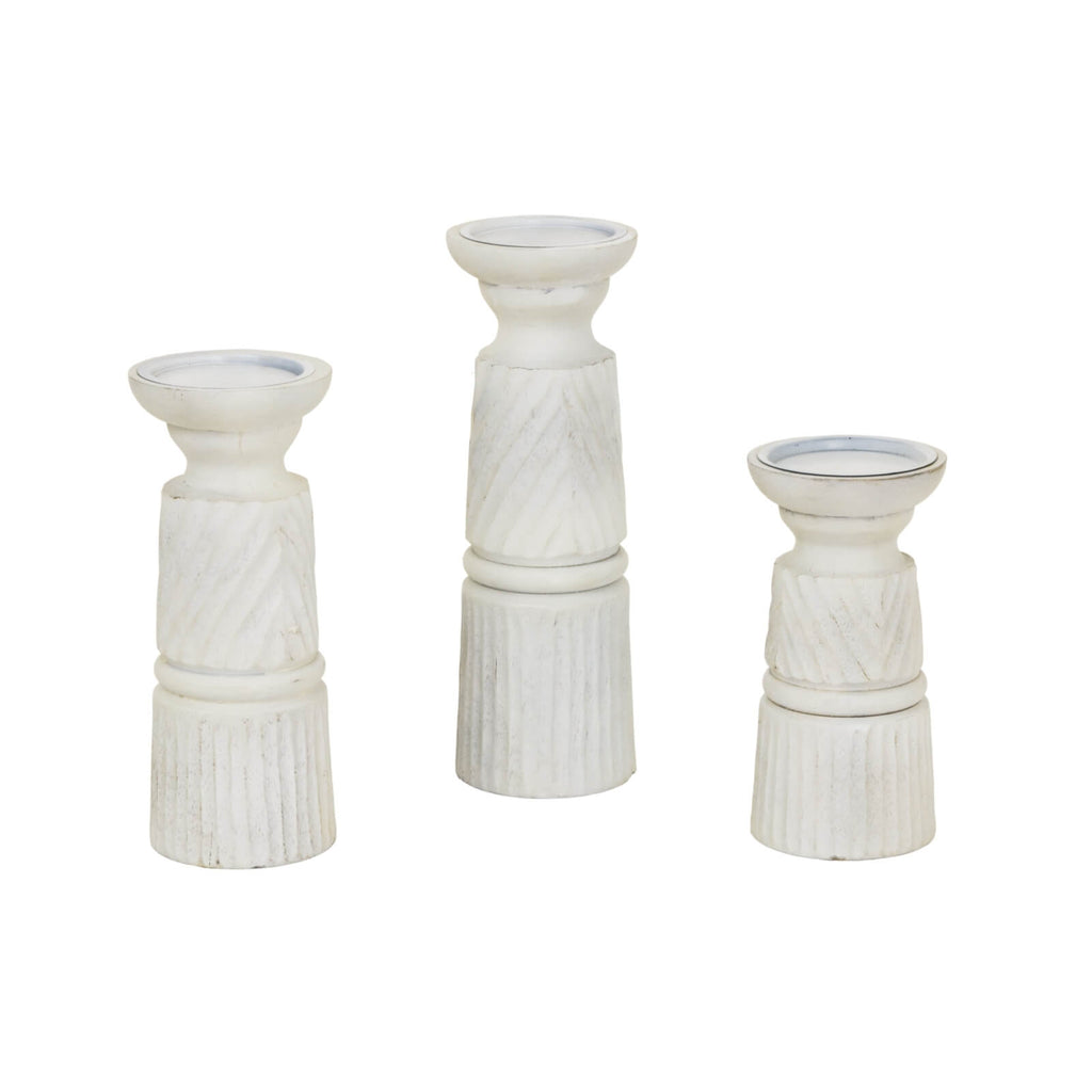 Hand-carved white wooden candle holder with geometric patterns, perfect for elegant home decor centerpiece. by RoomLondon at brixbailey.com