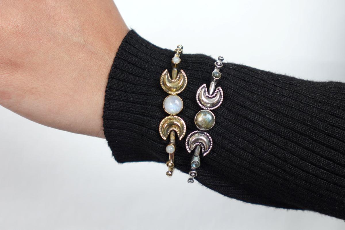 Double Moonstone Lunar Cuff Bracelet - Brass and silver cuffs with crescent moons and moonstones—mystical and chic.