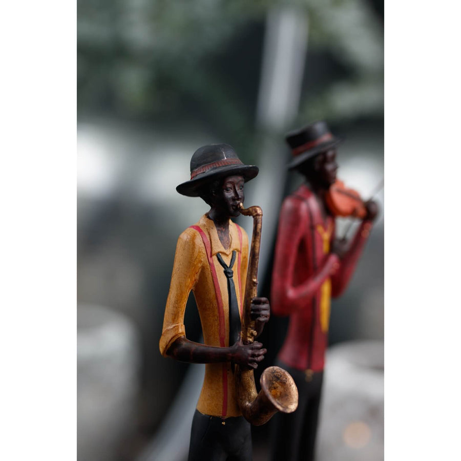 Bronze and gold saxophonist sculpture, modernist jazz musician in motion, elegant home decor for music lovers by Sostter at brixbailey.com