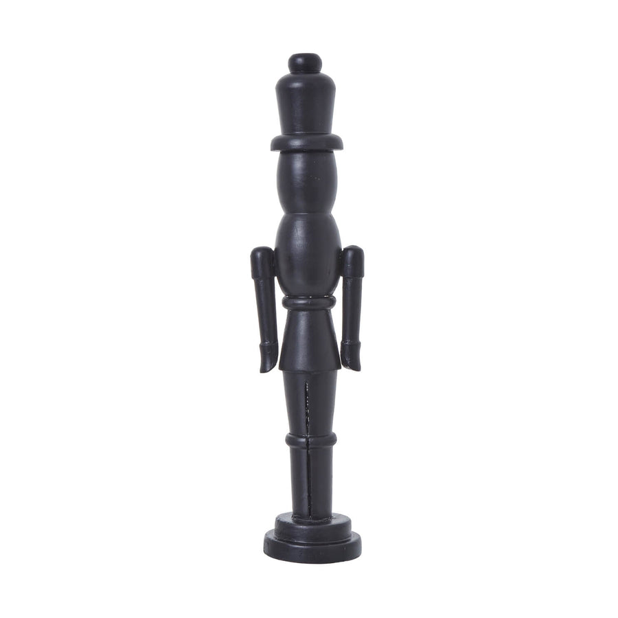 Black wooden Nordic nutcracker with minimalist design, 50cm tall, for modern Christmas decor. by Sostter at brixbailey.com