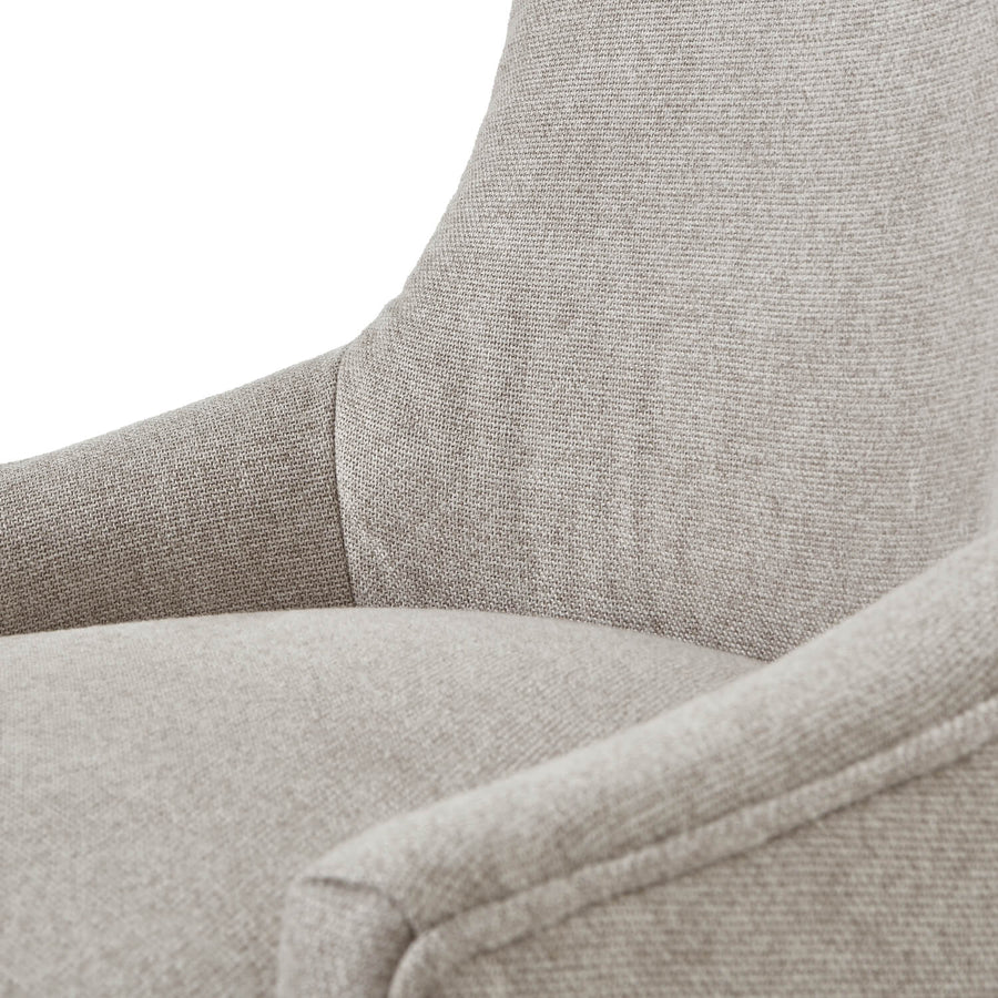 Oatmeal twill dining chair with tufted detailing, curved back, and solid oak legs for elegant comfort. by Sostter at brixbailey.com